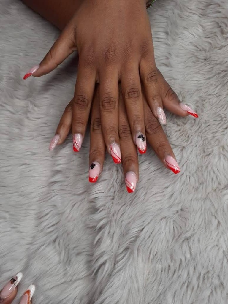 Nail art with red accents